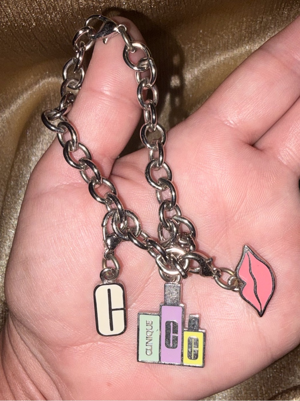 Clinique Silver Charm Bracelet with Pastel Lip & Cosmetic Charms